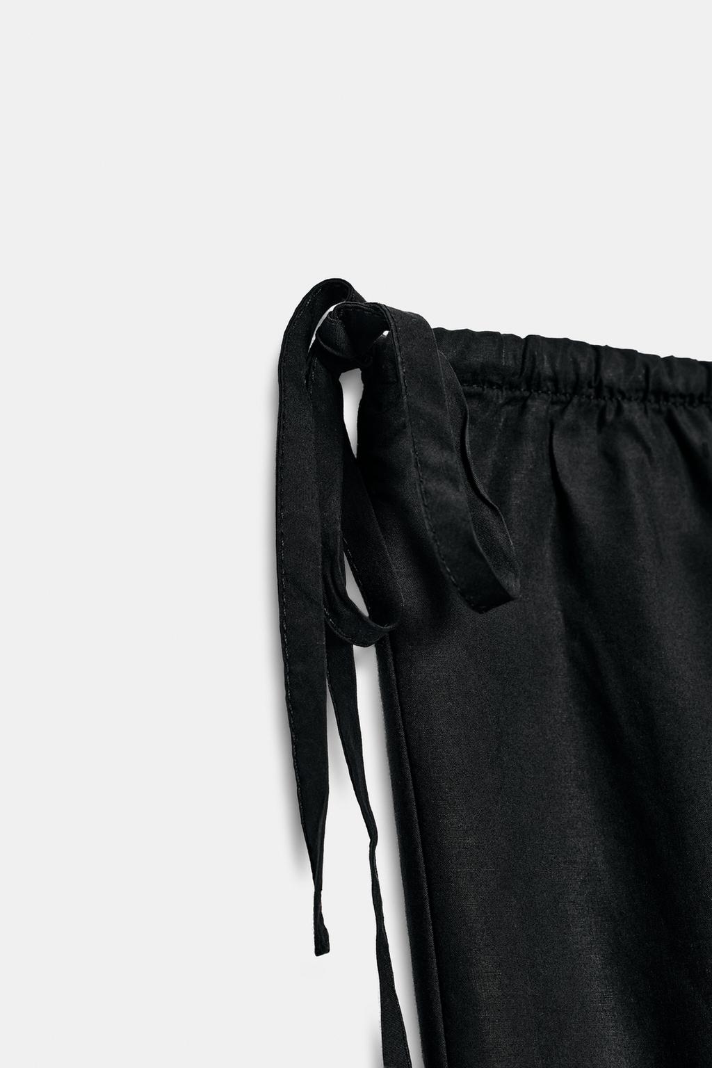 УКОРОЧЕННЫЕ БРЮКИ ИЗ СТРУЯЩЕЙСЯ ТКАНИ С ЗАВЯЗКАМИ