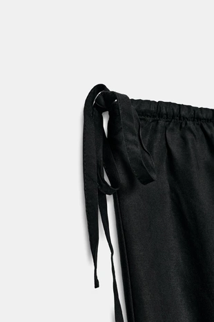 Укороченные брюки из струящейся ткани с завязками- Заказать в России