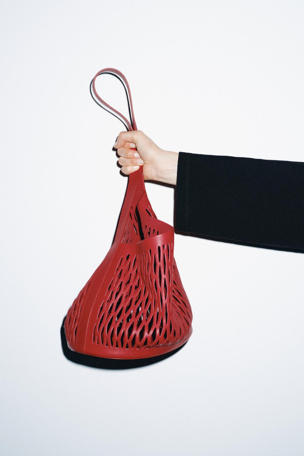 КОЖАНАЯ СУМКА С ПЕРФОРАЦИЕЙ