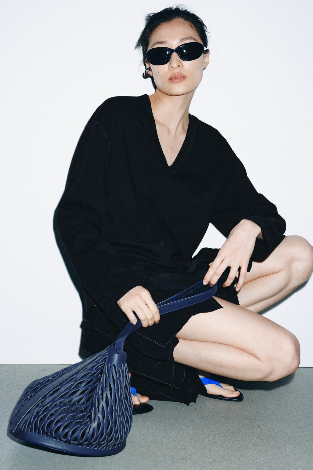 КОЖАНАЯ СУМКА С ПЕРФОРАЦИЕЙ