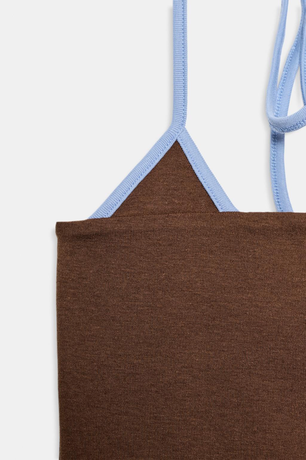 КРОП-ТОП С ГОРЛОВИНОЙ ХАЛТЕР И КОНТРАСТНОЙ ОКАНТОВКОЙ