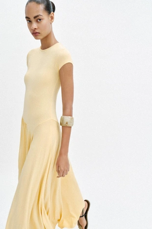 Длинное платье асимметричного кроя- Заказать в России