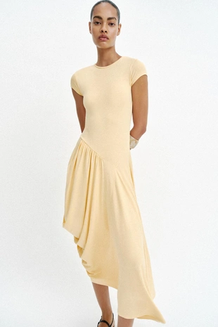 Длинное платье асимметричного кроя- Заказать в России