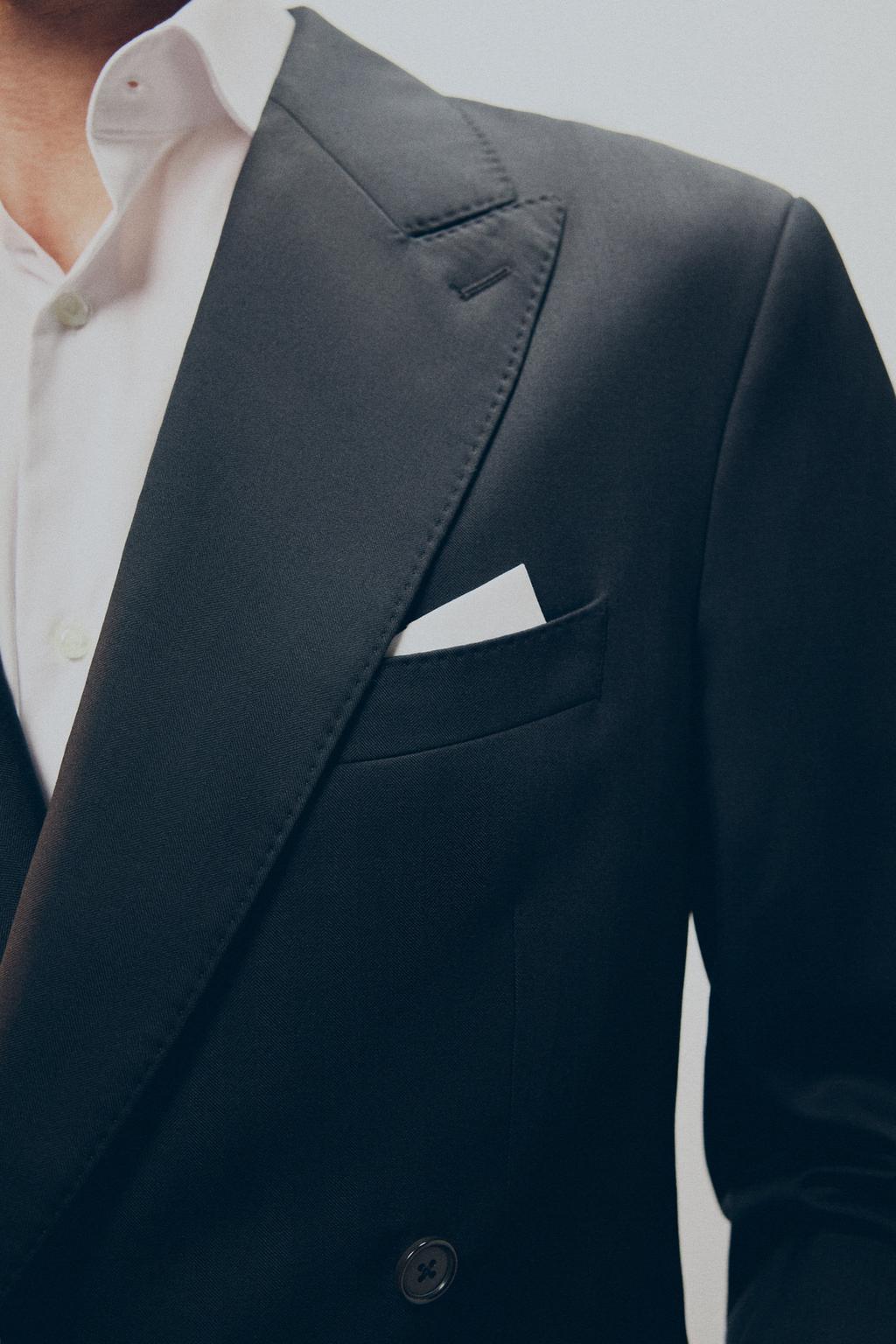 КОСТЮМНЫЕ БРЮКИ ИЗ 100% ШЕРСТИ С ЗАЩИПАМИ