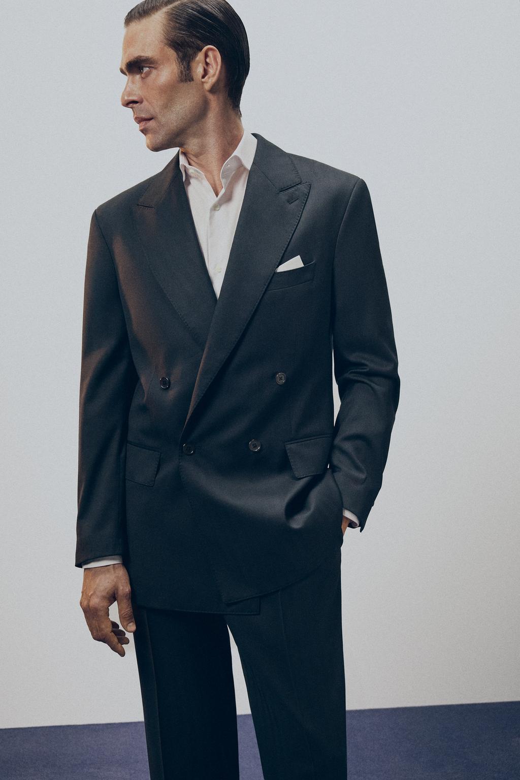 КОСТЮМНЫЕ БРЮКИ ИЗ 100% ШЕРСТИ С ЗАЩИПАМИ