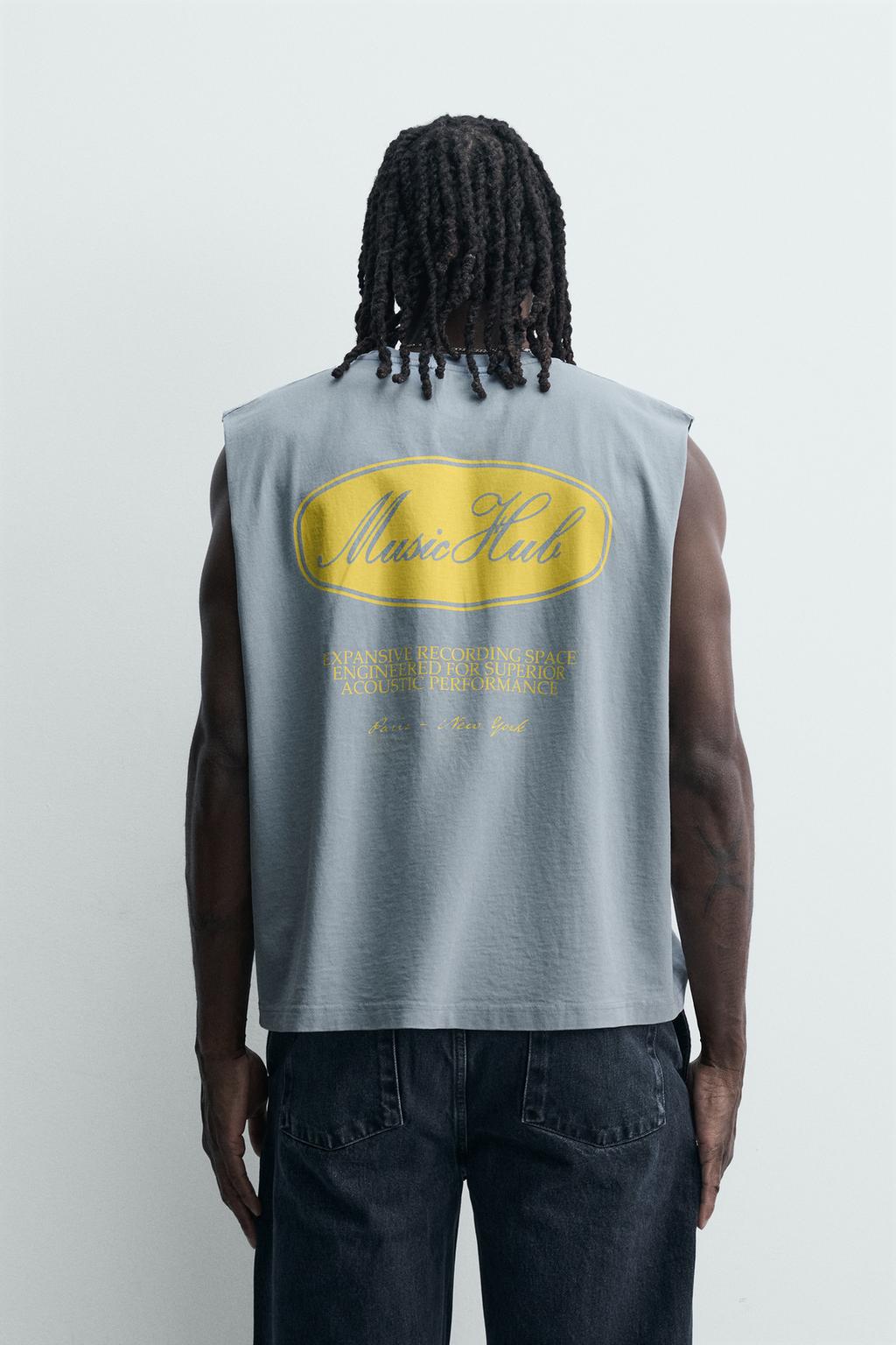 МАЙКА ИЗ ТКАНИ С ЭФФЕКТОМ ПОТЕРТОСТИ С ПРИНТОМ