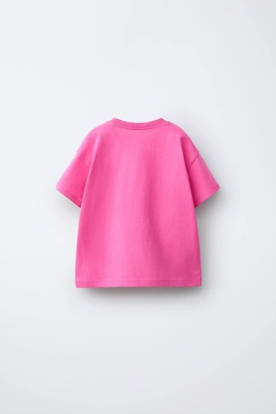 Футболка с карманом и воланами