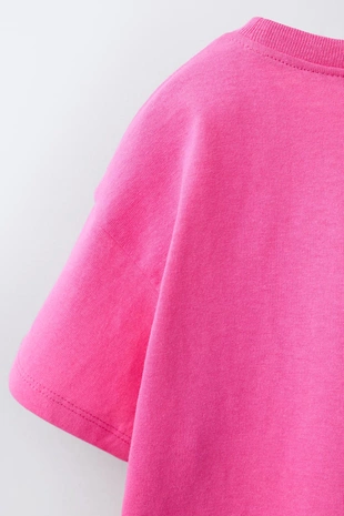 Футболка с карманом и воланами