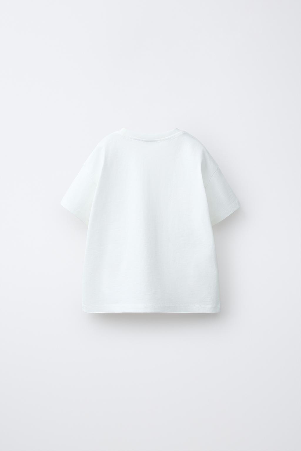 ФУТБОЛКА С КАРМАНОМ И ВОЛАНАМИ