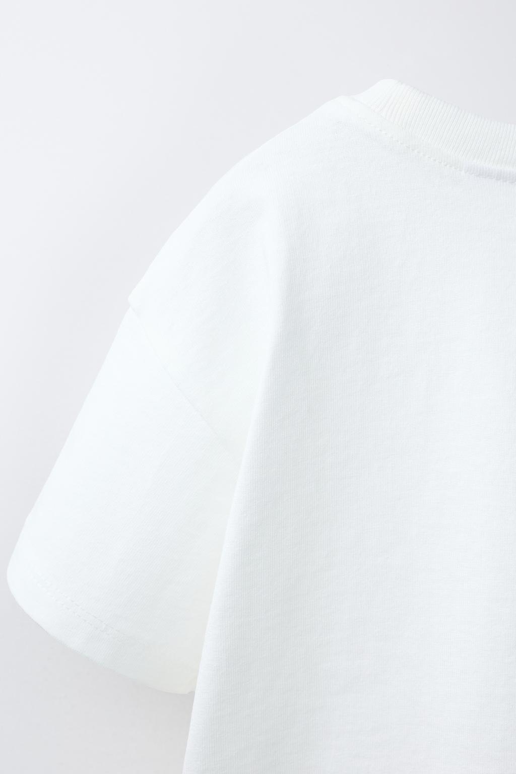 ФУТБОЛКА С КАРМАНОМ И ВОЛАНАМИ