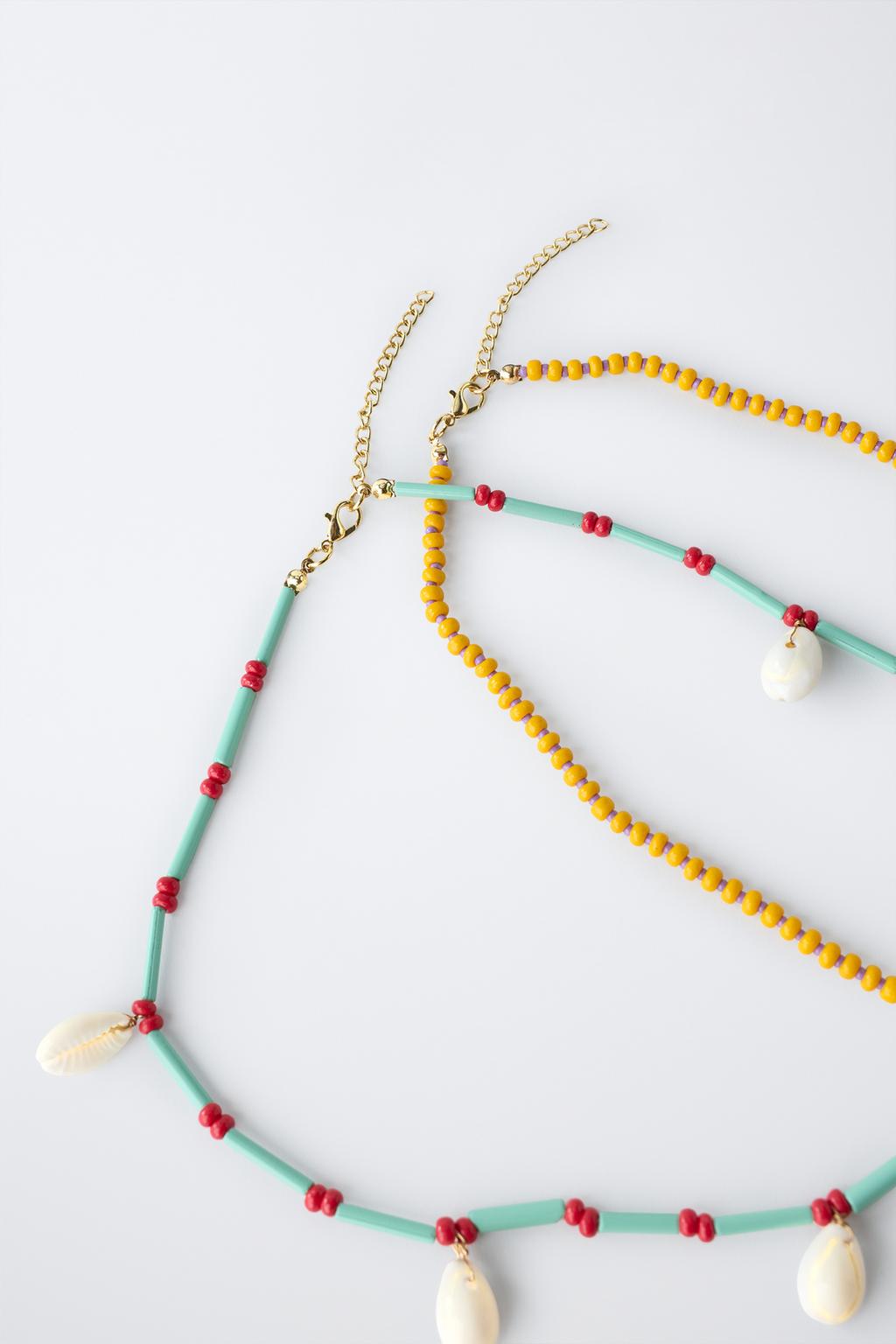 НАБОР ИЗ ДВУХ ОЖЕРЕЛИЙ С БУСИНАМИ И РАКОВИНАМИ