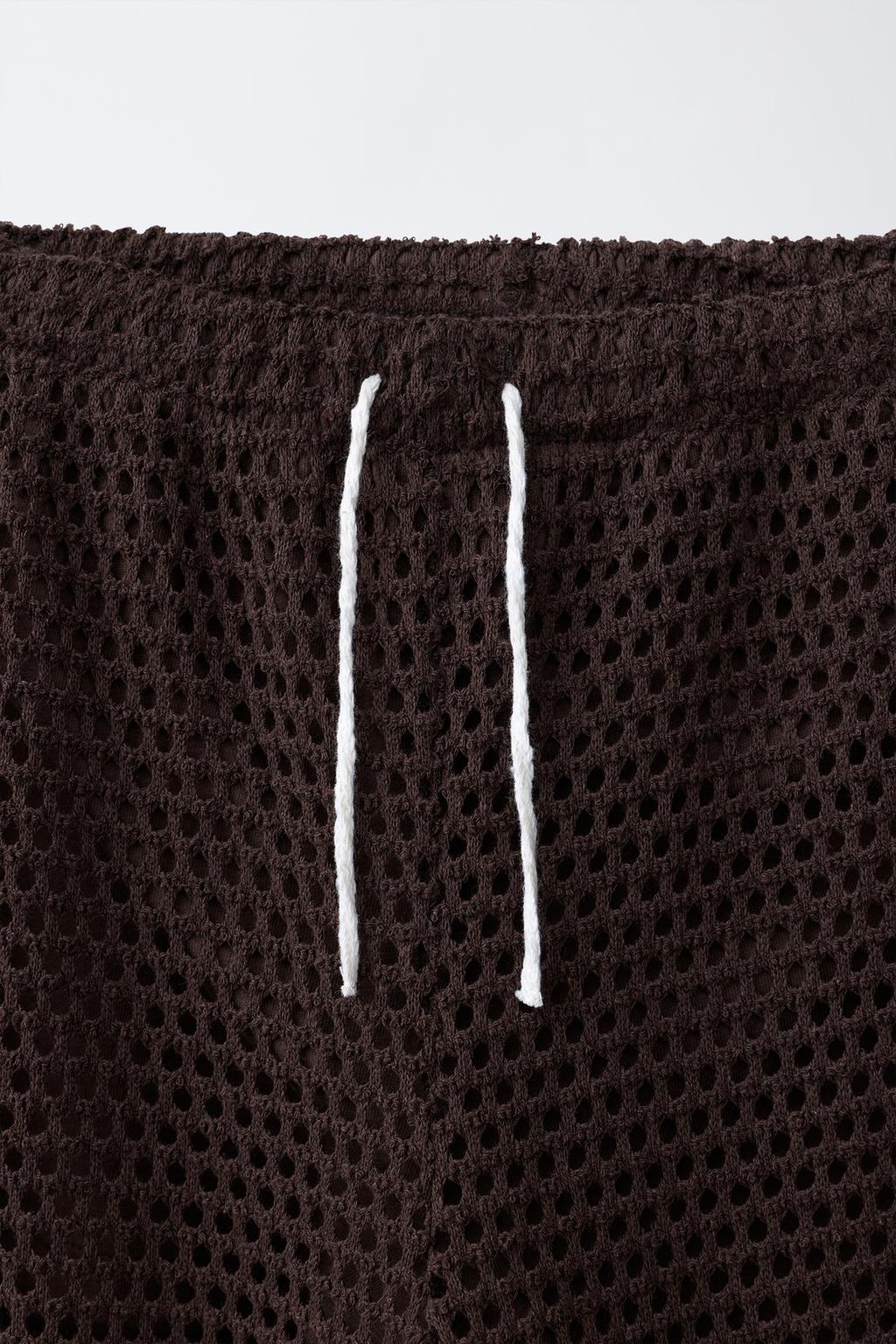 БРЮКИ WIDE LEG С ВЯЗАНЫМИ ЦВЕТАМИ