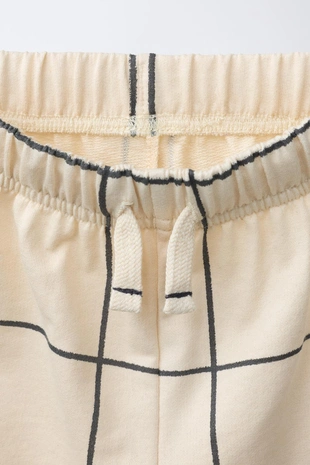 Комплект джоггеры, футболка с карманом и шорты в клетку- Заказать в России