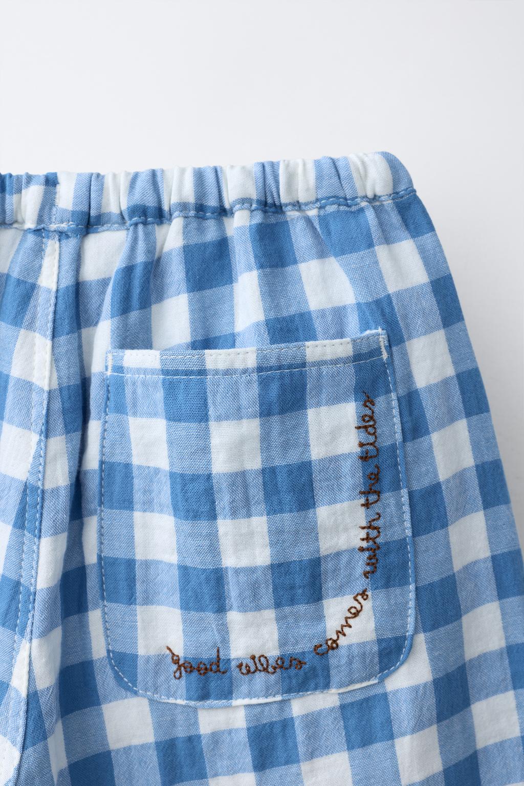 БРЮКИ С ТЕКСТУРОЙ ВИШИ В КЛЕТКУ