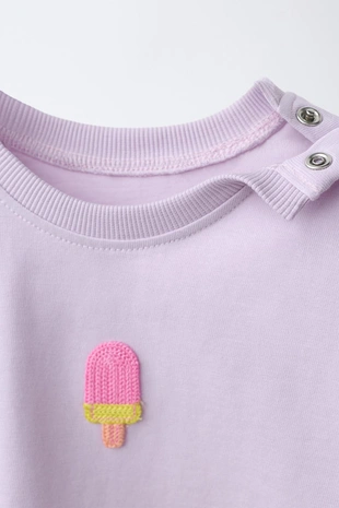 Футболка с нашивкой кроше- Заказать в России