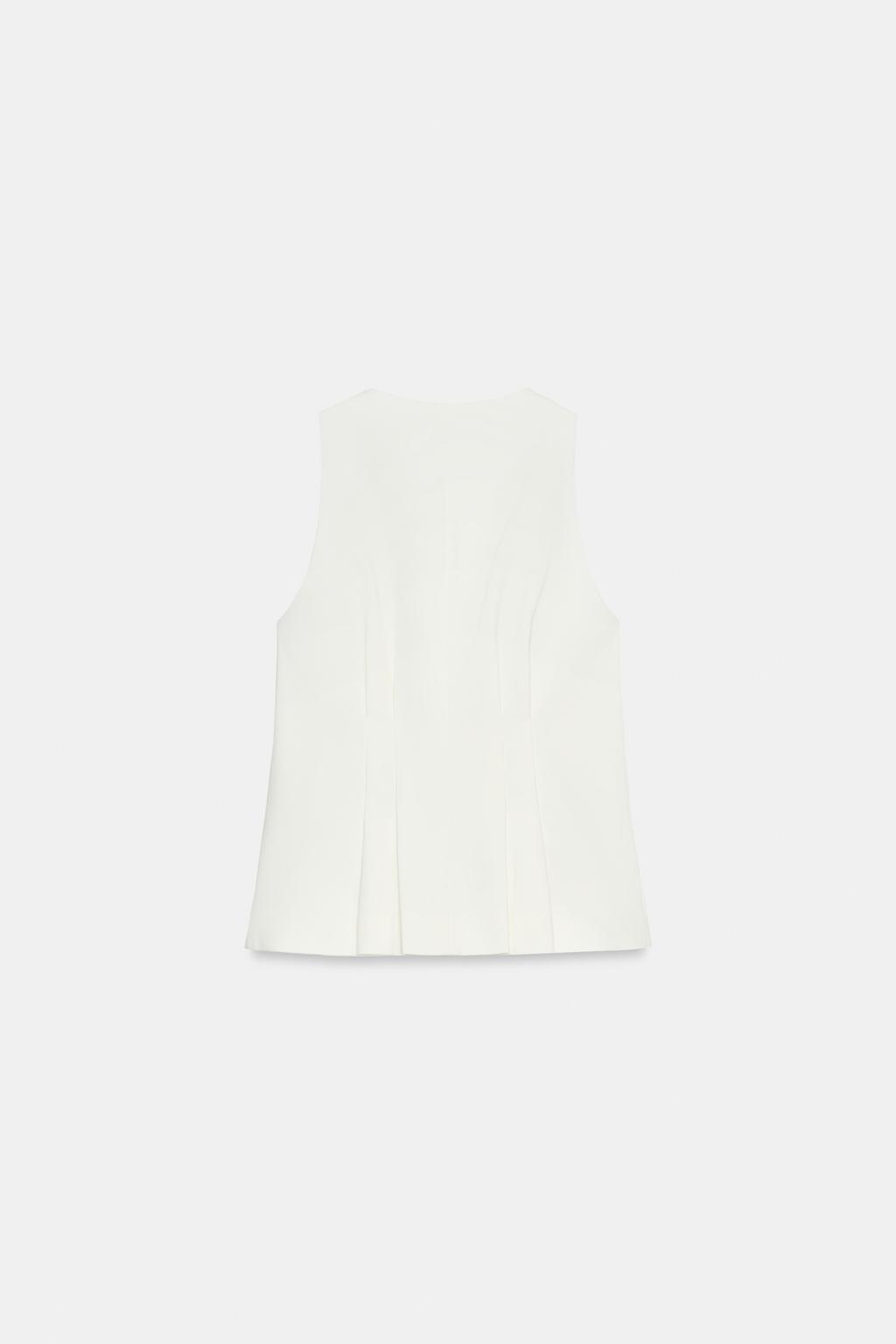 ЖИЛЕТ С БАСКОЙ И ЗАЩИПАМИ