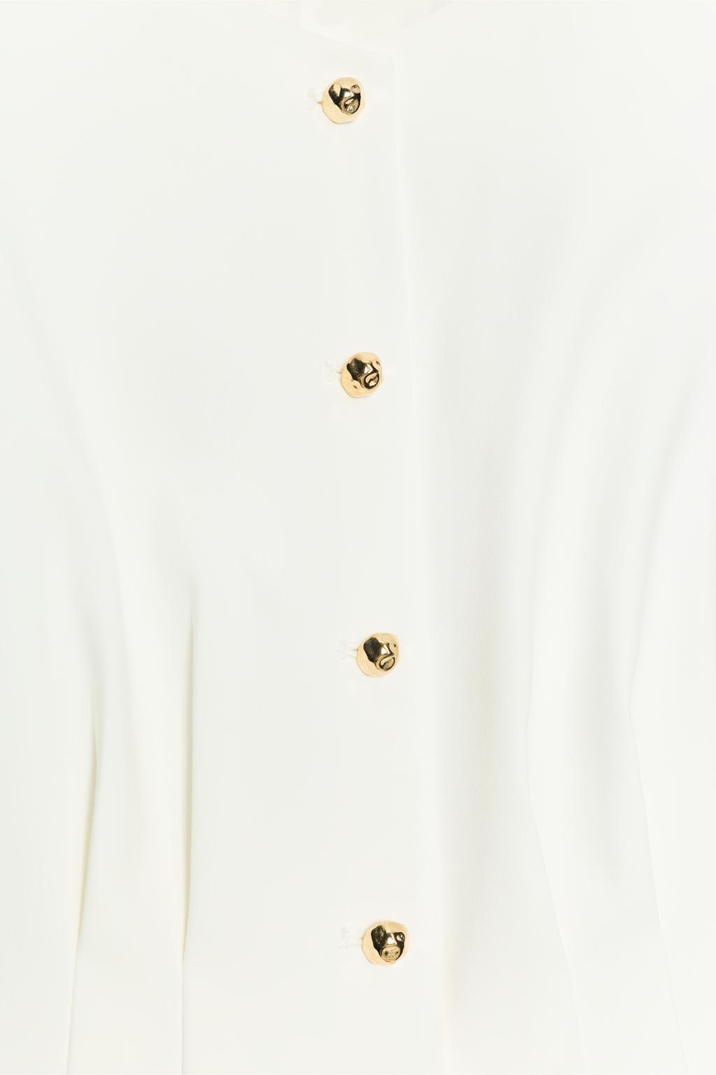 ЖИЛЕТ С БАСКОЙ И ЗАЩИПАМИ