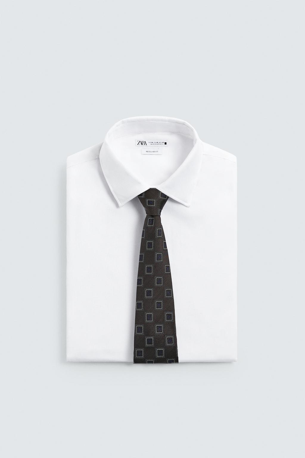 ШЕЛКОВЫЙ ЖАККАРДОВЫЙ ГАЛСТУК С ГЕОМЕТРИЧЕСКИМ УЗОРОМ