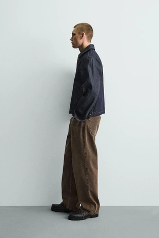 Джинсы Relaxed Fit с вощеным эффектом- Заказать в России