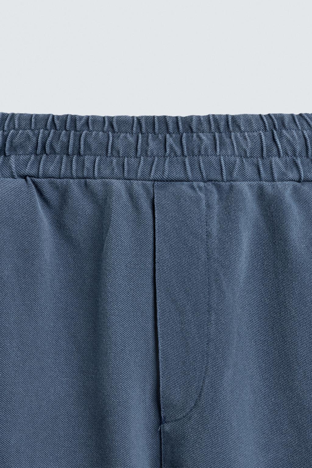 ШОРТЫ-БЕРМУДЫ ИЗ ХЛОПКОВОГО ПИКЕ REGULAR FIT С ЭФФЕКТОМ ПОТЕРТОСТИ