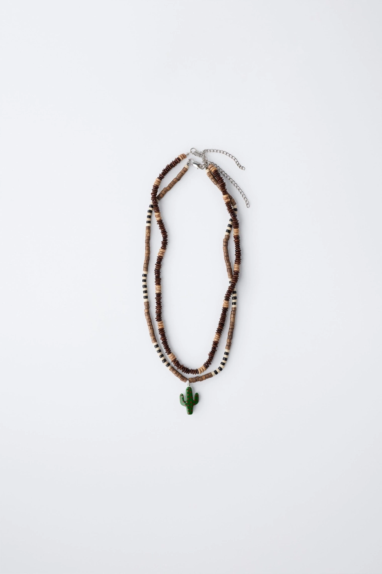 Набор из двух деревянных бусинных ожерелий с куликом