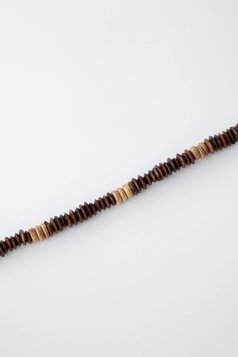 Набор из двух деревянных бусинных ожерелий с куликом