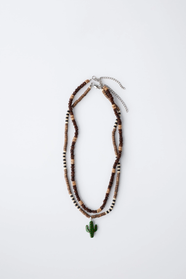 Набор из двух деревянных бусинных ожерелий с куликом