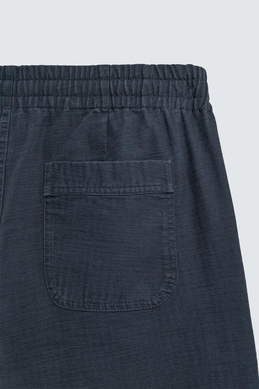 БРЮКИ RELAXED FIT В ЕЛОЧКУ