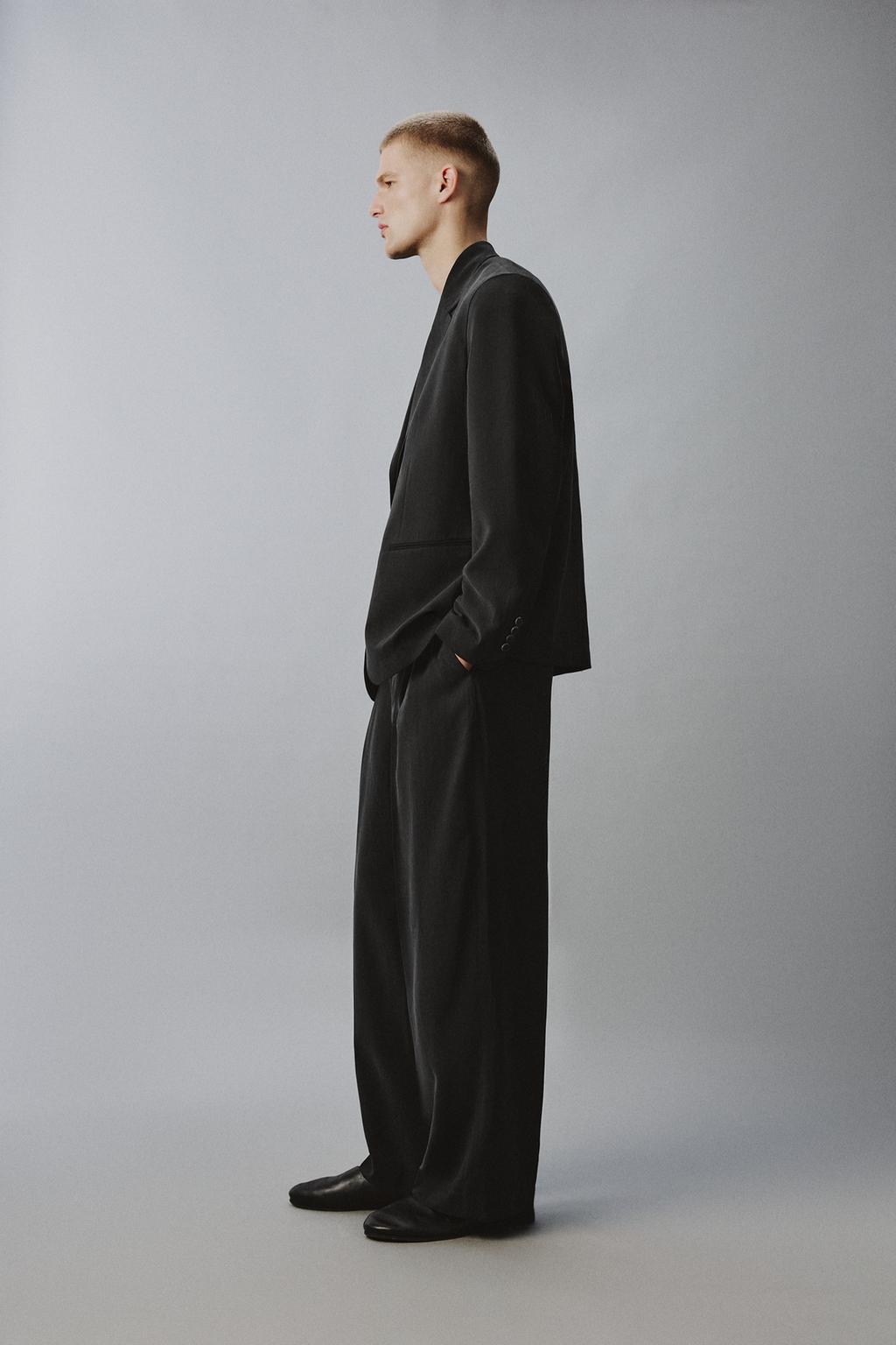 СТРУЯЩИЕСЯ БРЮКИ RELAXED FIT
