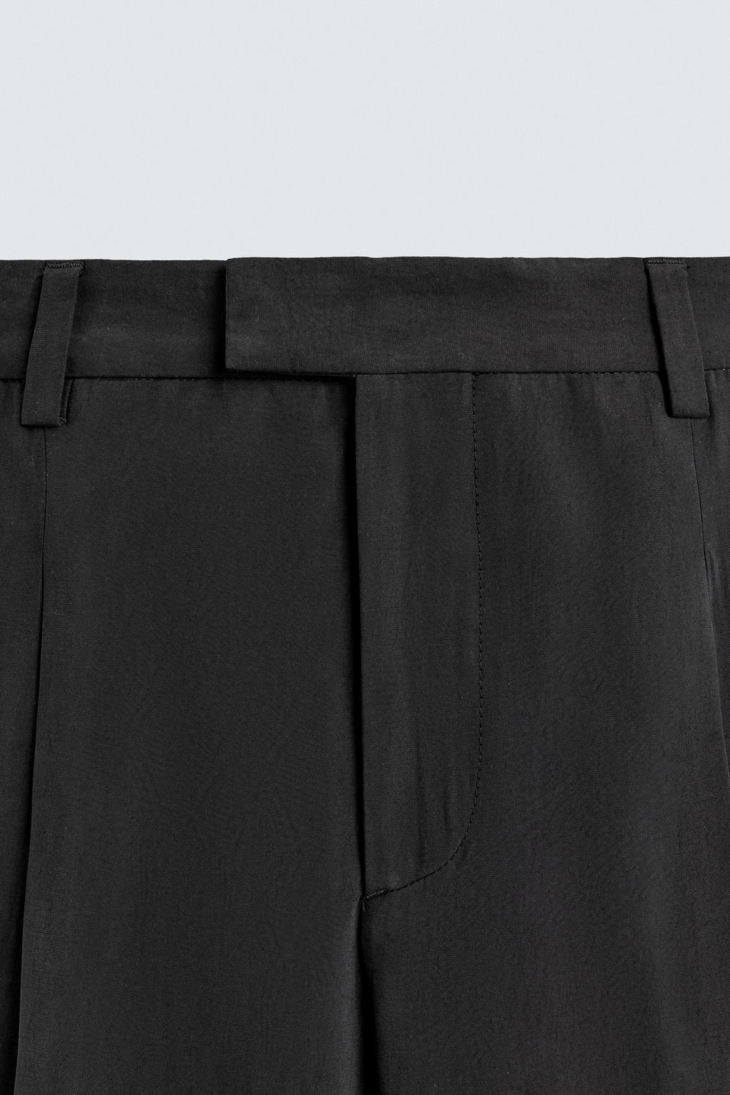 СТРУЯЩИЕСЯ БРЮКИ RELAXED FIT