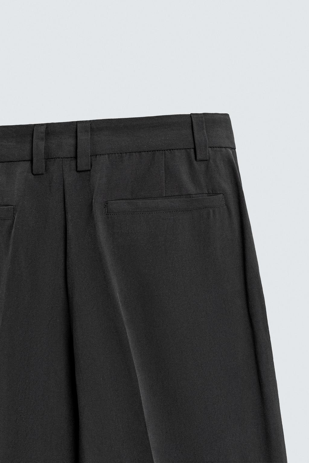 СТРУЯЩИЕСЯ БРЮКИ RELAXED FIT