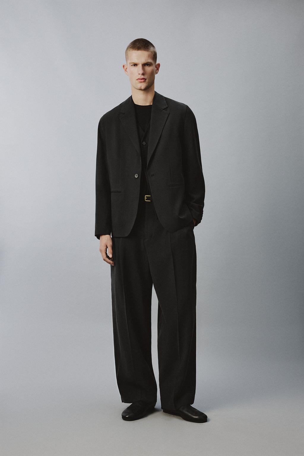 СТРУЯЩИЕСЯ БРЮКИ RELAXED FIT