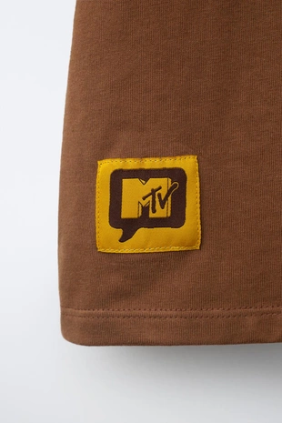 Футболка с принтом Mtv®- Заказать в России
