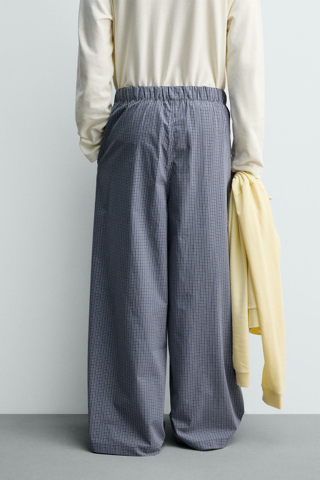 БРЮКИ RELAXED FIT В КЛЕТКУ С НАШИВКАМИ