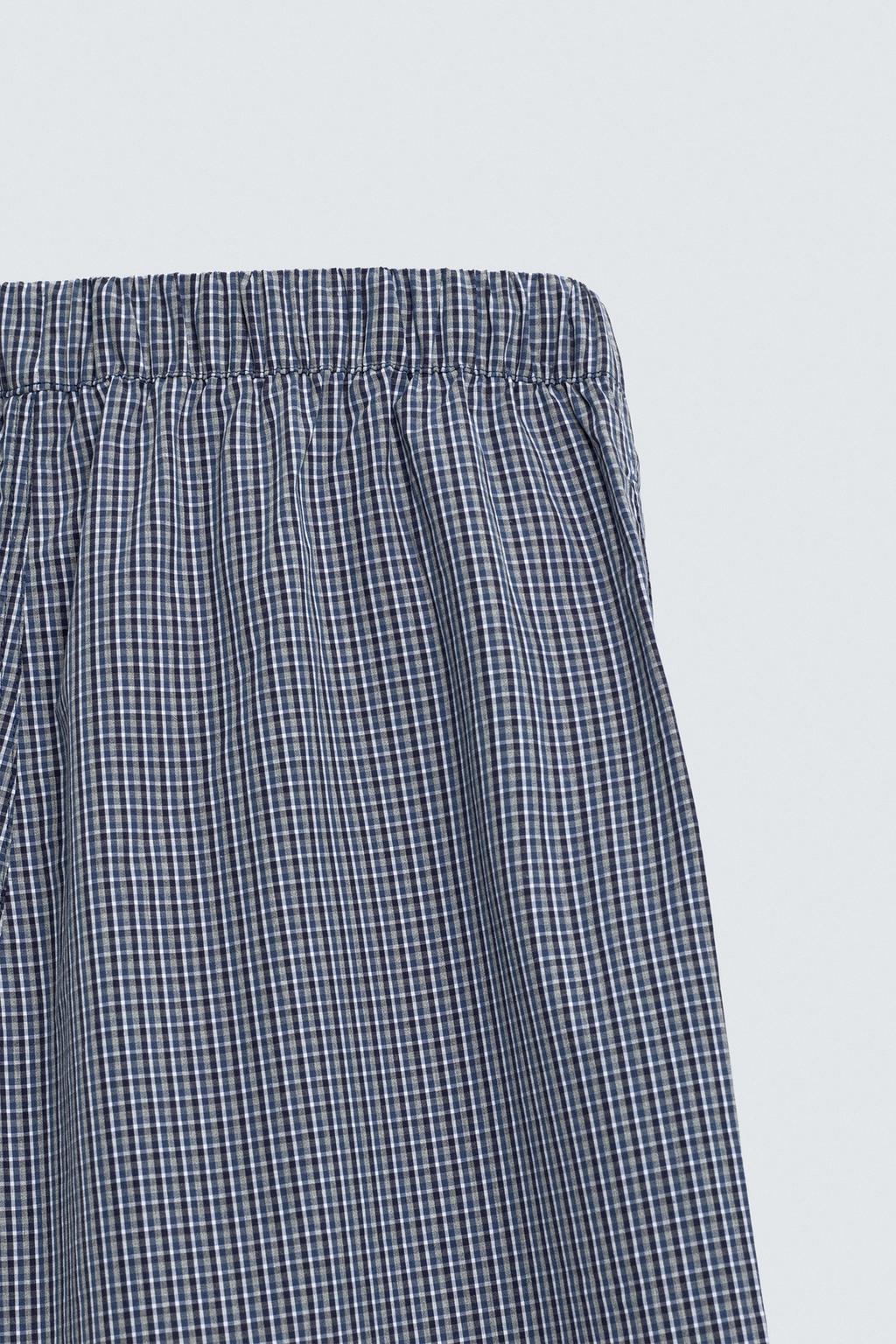 БРЮКИ RELAXED FIT В КЛЕТКУ С НАШИВКАМИ