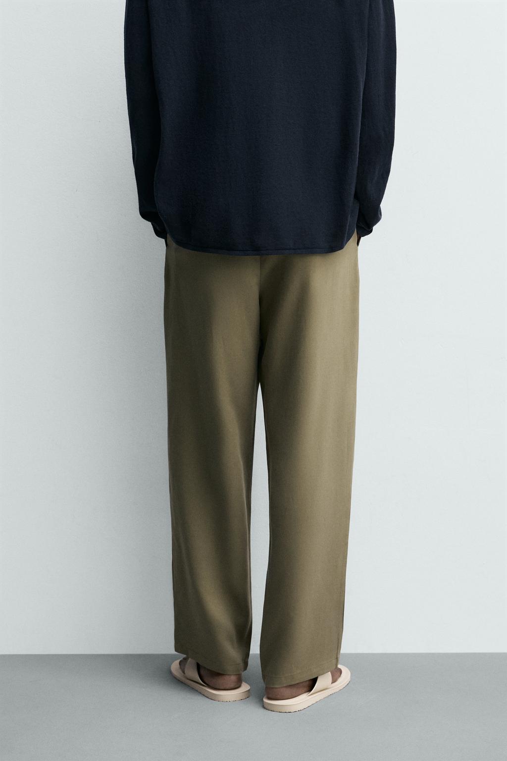 СТРУЯЩИЕСЯ БРЮКИ RELAXED FIT