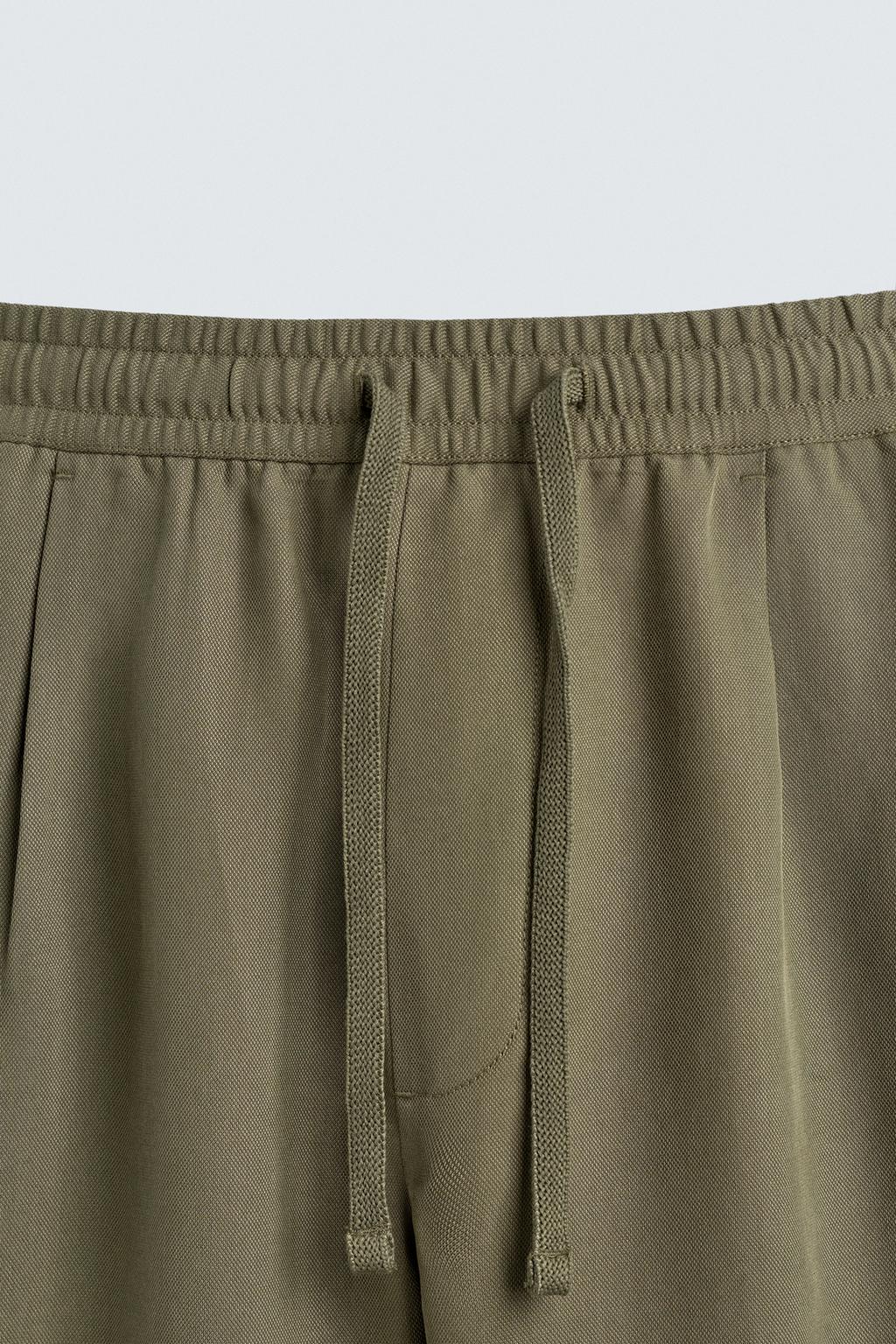 СТРУЯЩИЕСЯ БРЮКИ RELAXED FIT