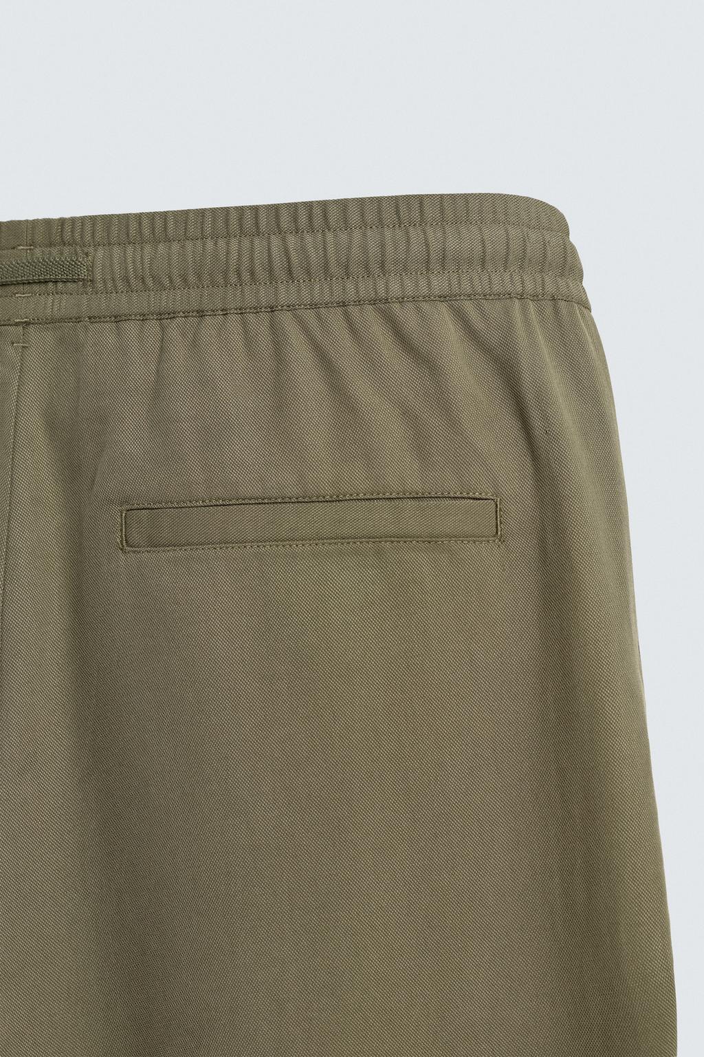 СТРУЯЩИЕСЯ БРЮКИ RELAXED FIT
