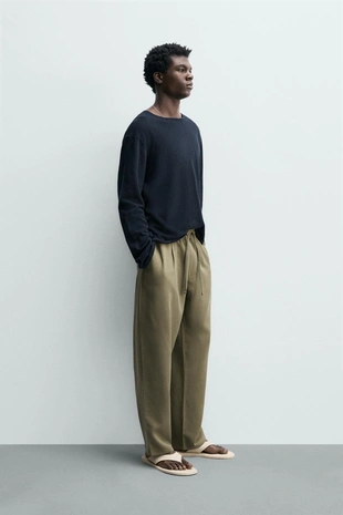 Струящиеся брюки Relaxed Fit- Заказать в России