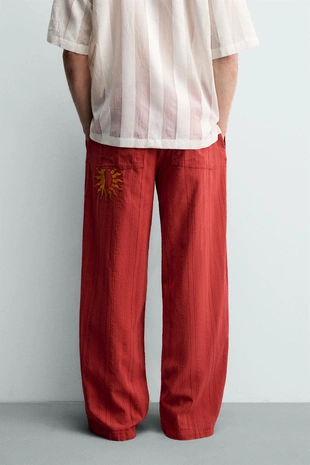 Брюки Relaxed Fit в полоску- Заказать в России
