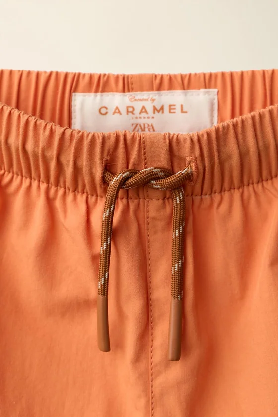 Плавательные шорты от caramel london x zara