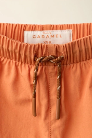 Плавательные шорты от caramel london x zara