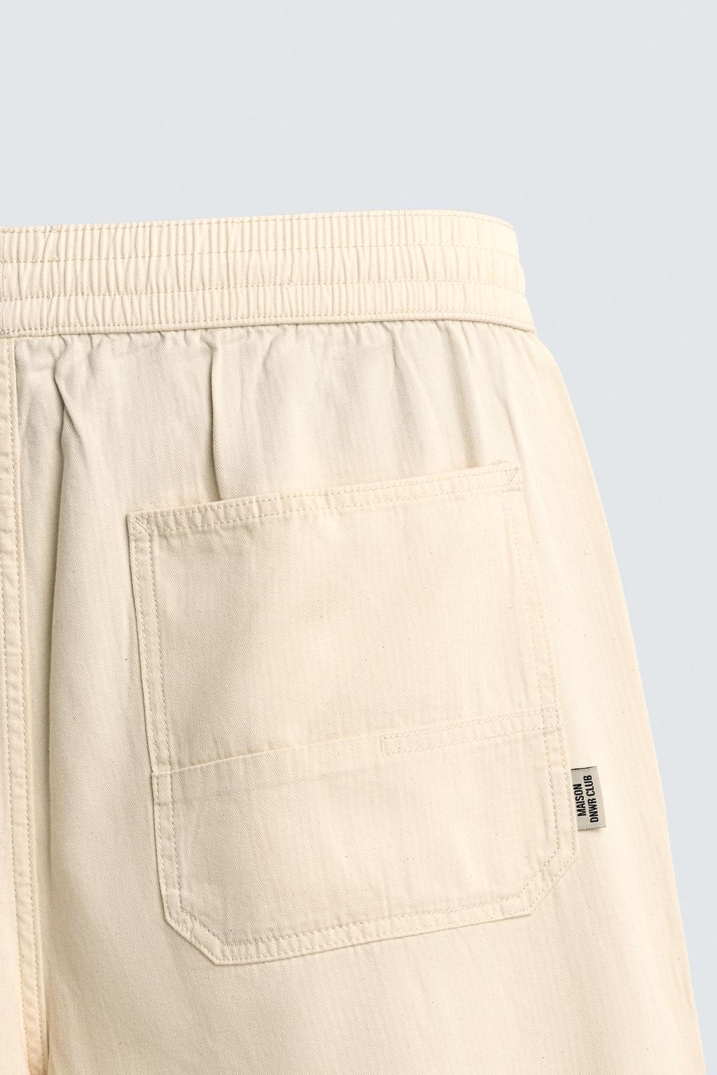 БРЮКИ RELAXED FIT В ЕЛОЧКУ