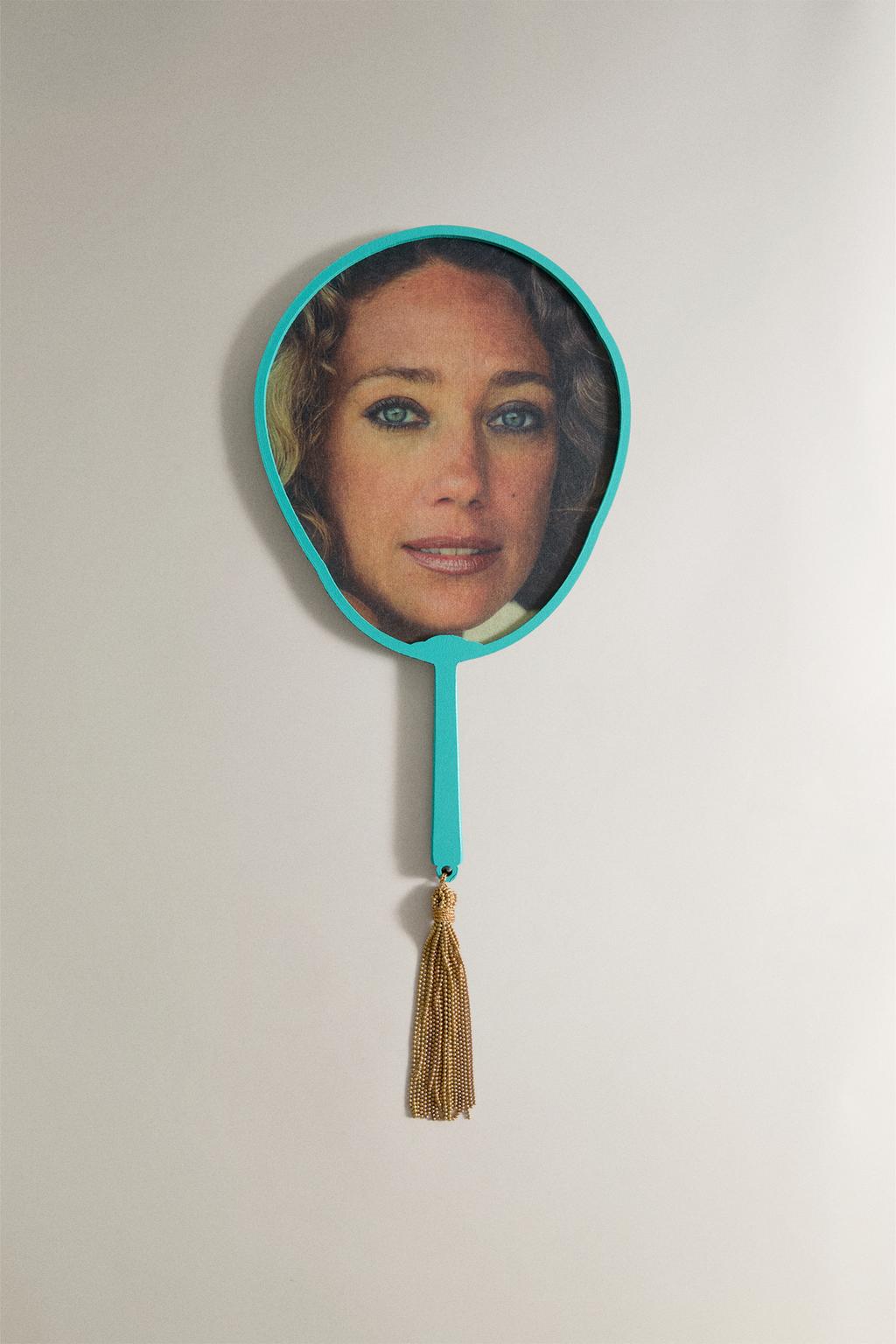 Веер из бумаги с изображением лица marisa berenson
