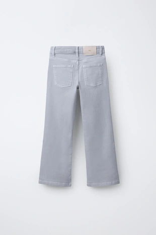 Джинсы Bootcut с заклепками- Заказать в России