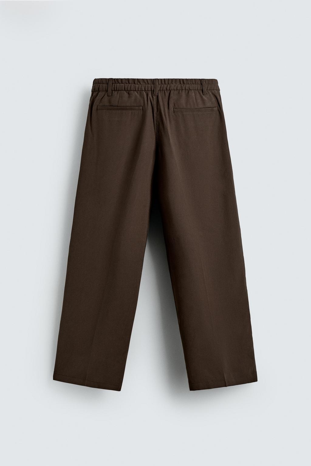 СТРУЯЩИЕСЯ БРЮКИ RELAXED FIT СО СКЛАДКАМИ