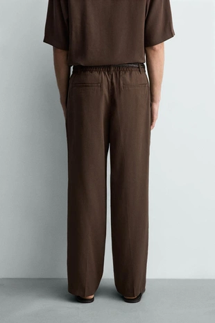 Струящиеся брюки Relaxed Fit со складками