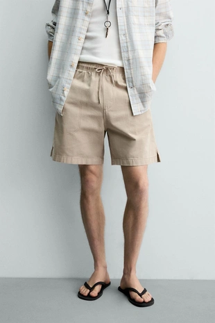 Шорты Relaxed Fit с эффектом потертости