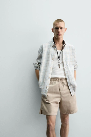 Шорты Relaxed Fit с эффектом потертости- Заказать в России