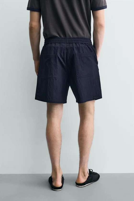 СТРУЯЩИЕСЯ ШОРТЫ RELAXED FIT